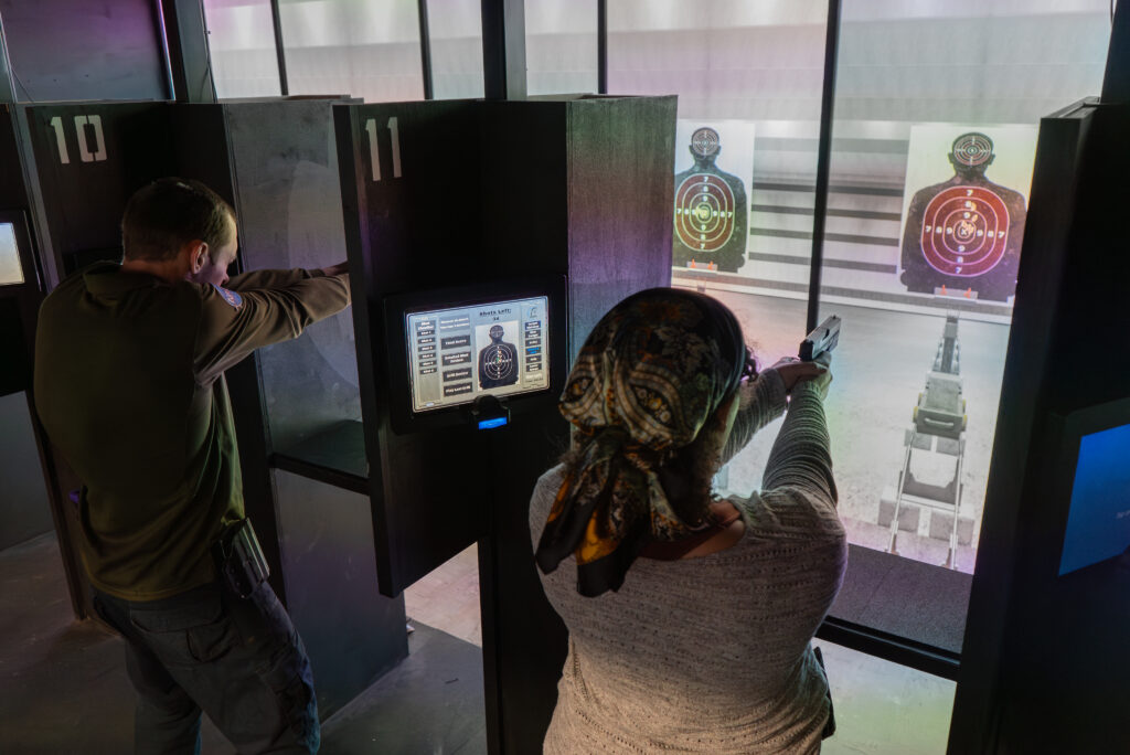 Guest on the shooting range at Decision Tactical in North Orlando — tactical firearms training experience with real modified weapons, zero live projectiles, available as a gift