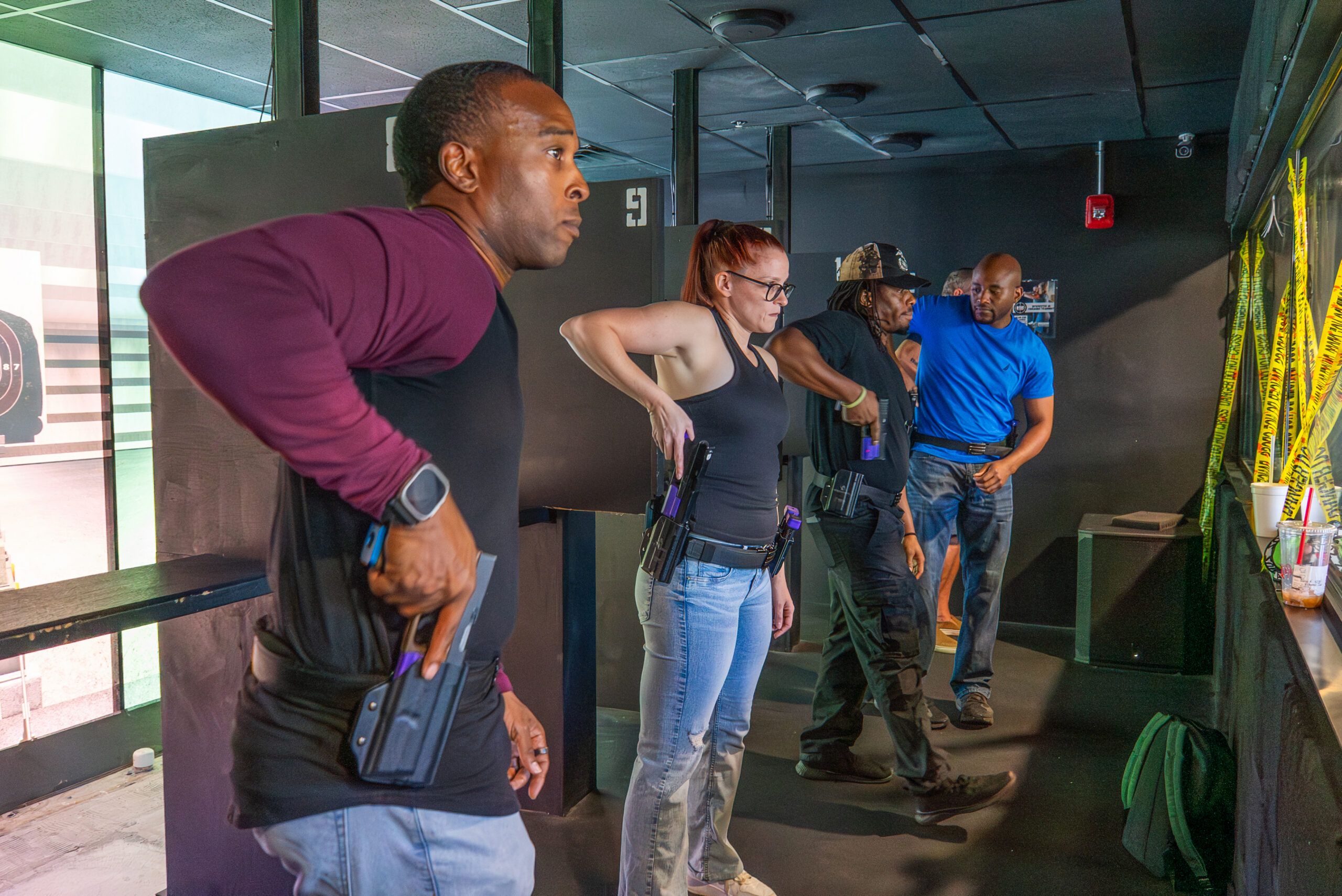 Guest group on the shooting range at Decision Tactical in North Orlando — captain-led firearms instruction included, no prior experience required